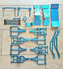 TRAXXAS T MAXX BLUE ANODISED ALLOY ARMS / SKIDS / BRACES / SERVO PROTECTOR