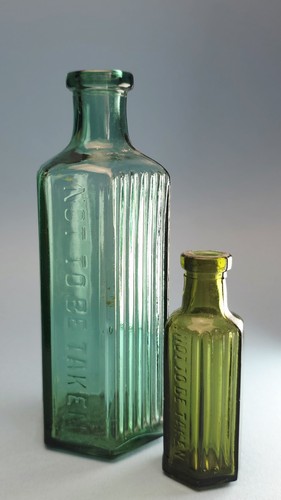 Two antique poison bottles not - antique,