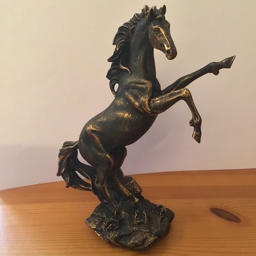 Bronzed standing rearing - standing,