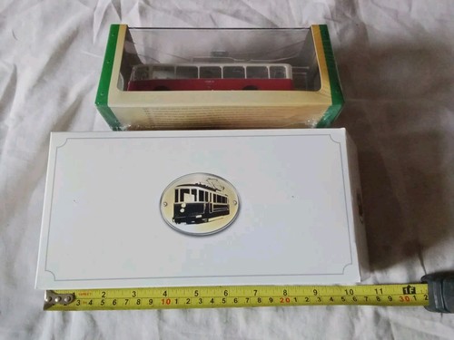 Tram and bus made - and,