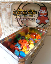 Gogos Crazy Bones Mixed Lot in Tin including Metalic & Clear ones