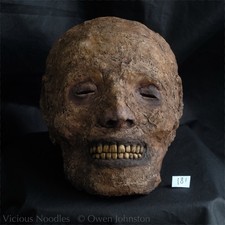 Replica mummified head, human