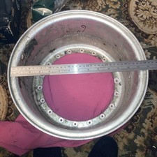 6 Inch Wide. Ally Split Rim. One Half. 18 Hole. 13” Diameter. Used Old Stock.