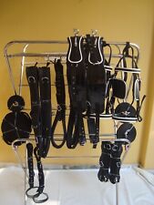 Black synthetic patent Driving harness for Double horse cart with White Trim.