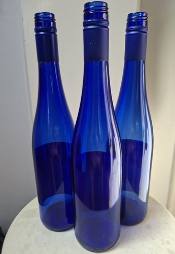 Blue glass wine bottles - wine,
