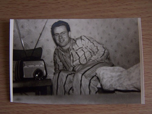 Man bed wearing pyjamas - wearing,