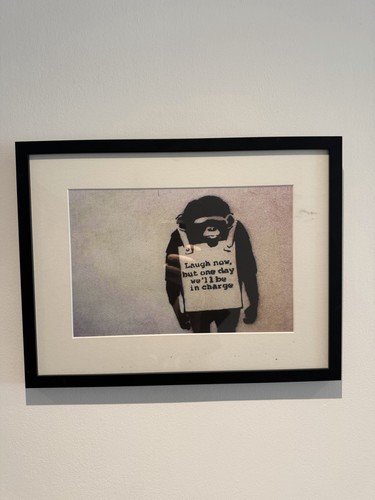Banksy laugh now - now", framed
