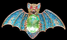Butler & Wilson Brooch bat in flight holding a green stone stamped boxed