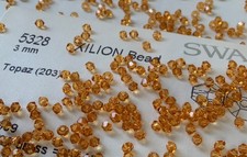 Swarovski Crystal Beads - 1440 Beads - 3mm Bicone - Topaz / Gold - Factory Pack