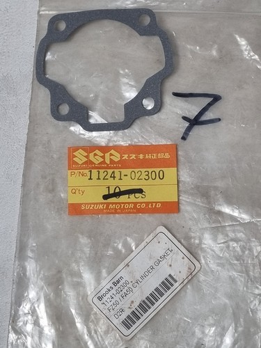Pair cylinder base gaskets - of,