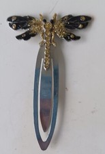 large silver paper/book clip