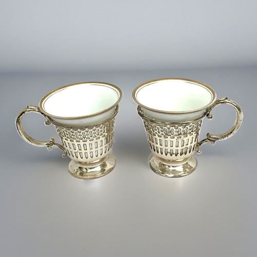 Two sterling silver demitasse - two,