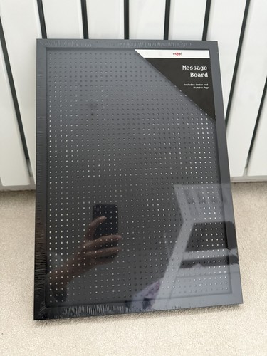Black message board with - message,