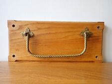 Vintage Church pew brass walking stick umbrella holder on oak panel