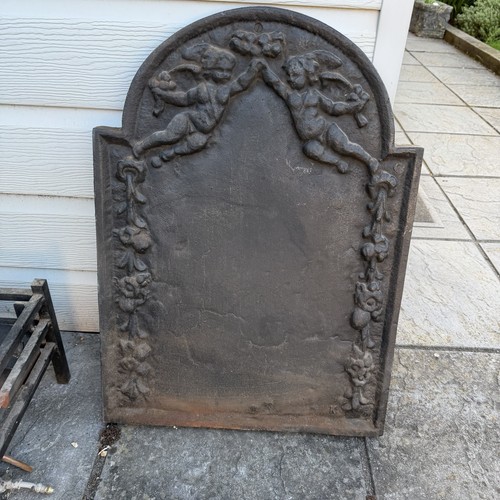 Cast iron cherub fire - cherub,