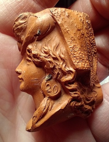 Clay pipe woman with nice - clay,