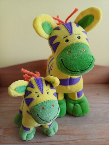 Two beanstalk toy - giraffes, one