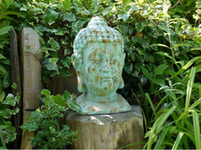 Large green Buddha head for