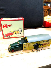 SCHUCO ,CAR ,GARAGE Steel NEVER PLAYED WITH,IN THE BOX.WORKS NEVER USED...