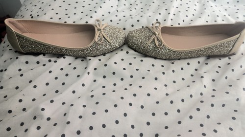 Golden sparkly flats for