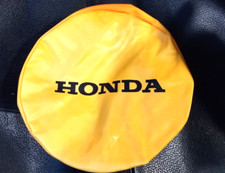 ORIGINAL MOTOPLAS HONDA ORANGE 7" HEADLIGHT COVER. SLIGHTLY FADED FRONT