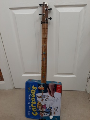 Cigar box guitar string - guitar,