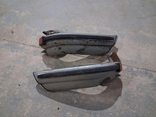 A pair of original Porsche 911 1969-73 rear bumper corners complete , light rust