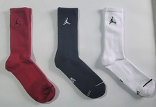 3 PAIRS OF BRAND NEW JORDAN CREW SOCKS. UNISEX. RED/BLACK/WHITE SHOE SIZE 8-12.