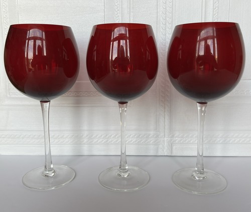 Three large wine glasses - three, with