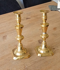 A pair of brass candlesticks