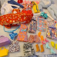 Large Bundle Of Barbie Size Dolls Clothes With Shoes, accessories.