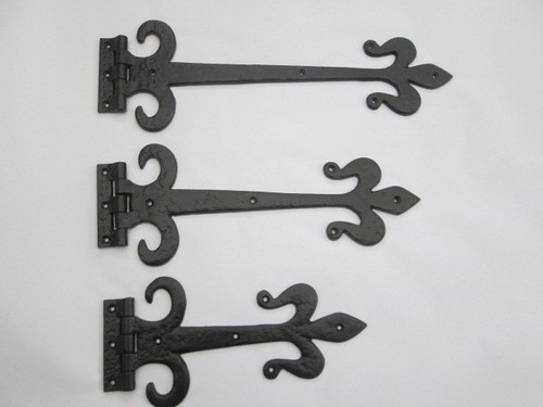 Pair cast iron fleur lys - cast,