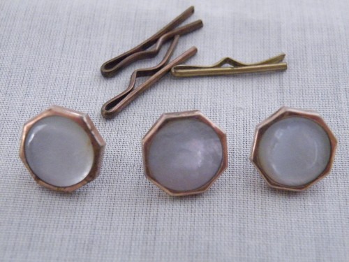 Three antique gold toned - three,