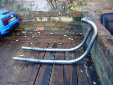 Norton exhaust pair  1 3/8"