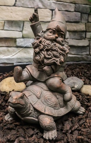 Adventurous gnome sitting - gnome,