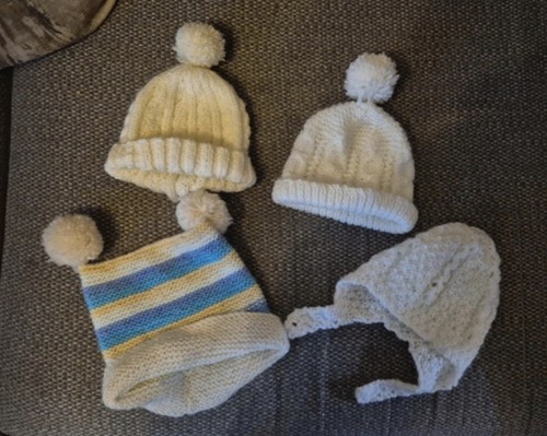 Hand knitted baby - hand,