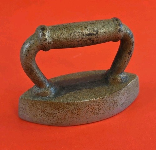 Antique cast iron mini - iron,