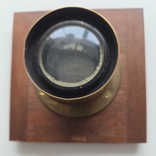 Vintage Brass Lens    - mounted on wood - read carefully