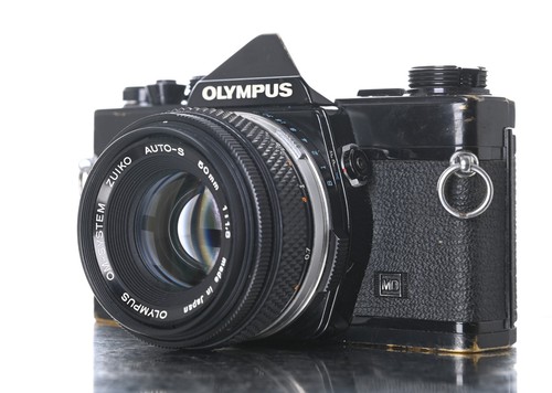 Olympus black 35mm film - olympus,