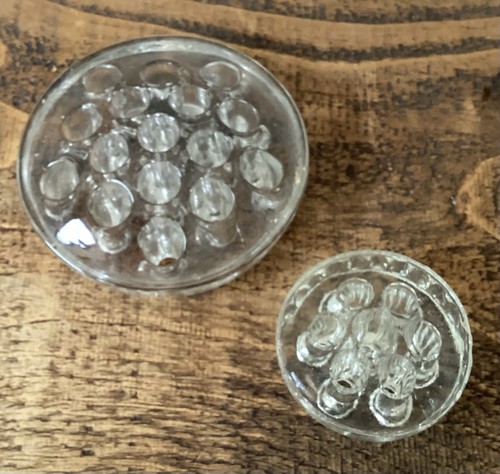 Two vintage glass flower frogs - two,