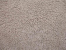 Light brown short curly hair