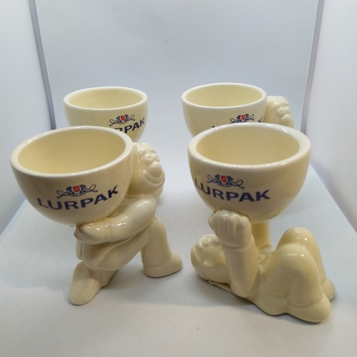 Different lurpak egg cups - different,