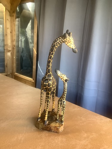 Hand carved wooden - hand, giraffe