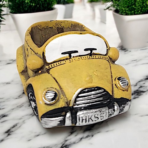 Vintage yellow car planter - car,