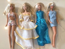A Variety Of Vintage Barbie Dolls