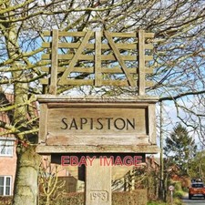 PHOTO  SAPISTON VILLAGE SIGN (2) SAPISTON SIGN TAKES THE FORM OF A SHEEP HURDLE