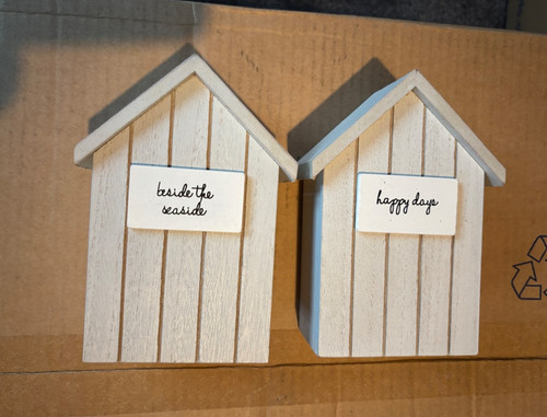 Beach hut happy days beside - hut,