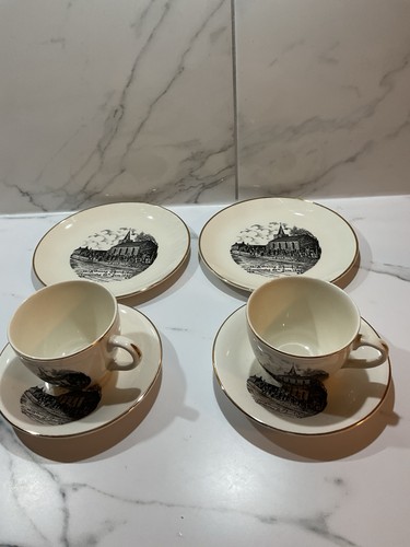 Two cups saucers side - two,
