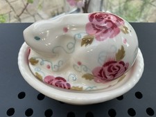 A rose and bee bunny on nest