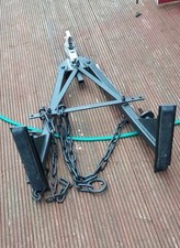 Car Towing a Frame Recovery